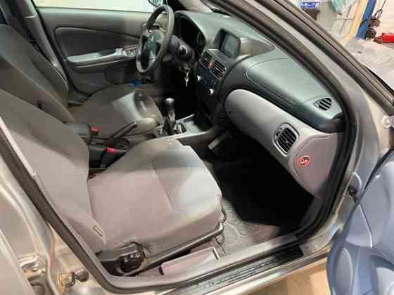 Nissan Almera Хамина