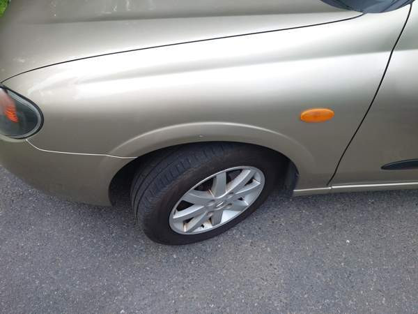 Nissan Almera Loppi - valokuva 5