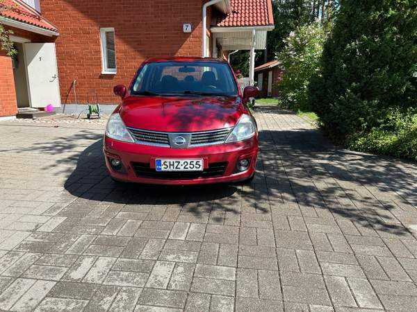 Nissan Tiida Лохья - изображение 2