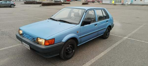 Nissan Sunny Kuusankoski - valokuva 1