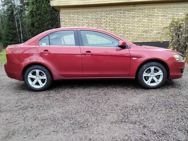 Mitsubishi Lancer Rauma - valokuva 8