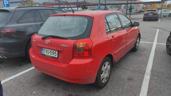 Toyota Corolla Luga - photo 2