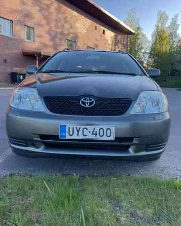 Toyota Corolla Райсио