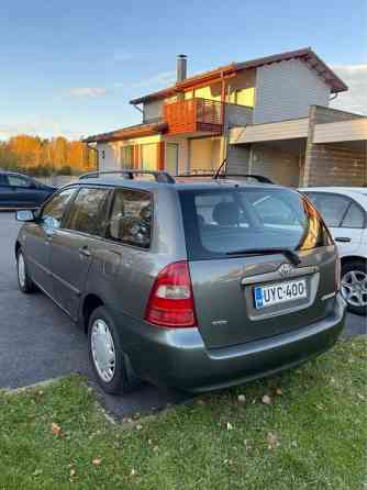 Toyota Corolla Райсио