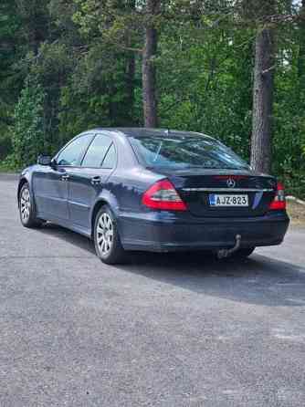 Mercedes-Benz E Каяни