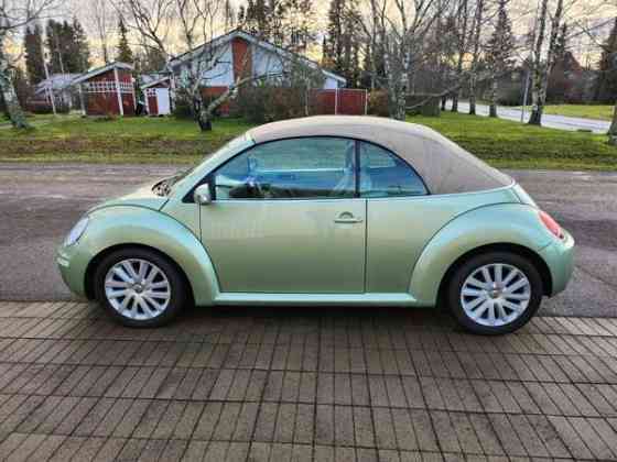 Volkswagen New Beetle Punkalaidun
