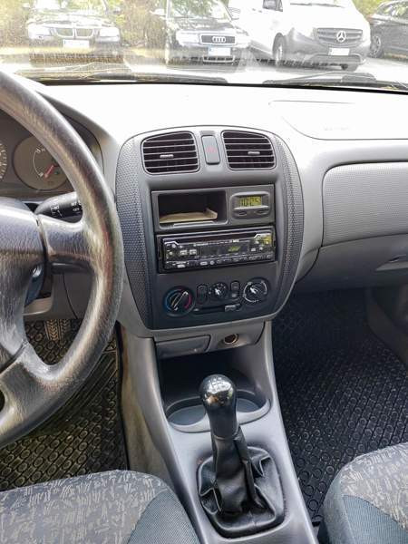 Mazda 323F Turtkul - valokuva 4