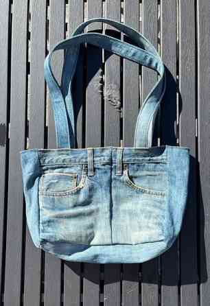 Ommeltu laukku Lempaeaelae