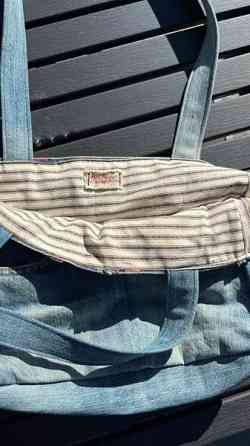 Ommeltu laukku Lempaeaelae