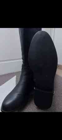 Naisten korkeavartiset saappaat Helsinki