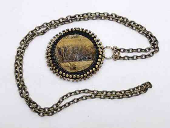 Kaulakoru tiikerinsilmä kivellä Миккели