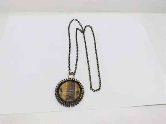 Kaulakoru tiikerinsilmä kivellä Миккели