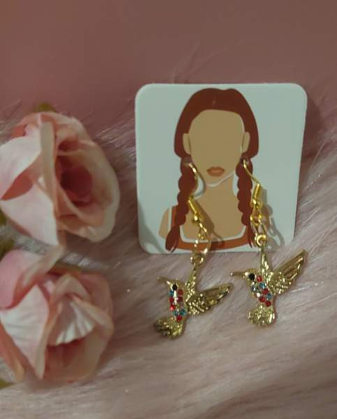 Korvakorut: kultaiset linnut Vantaa - valokuva 1