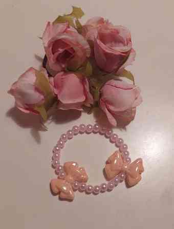 Rannekoru: pinkit rusetit Vantaa