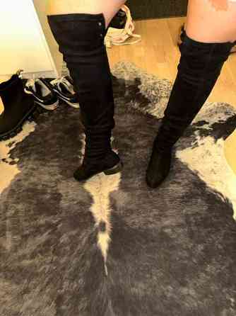 Mustat pitkät saappaat Kuopio