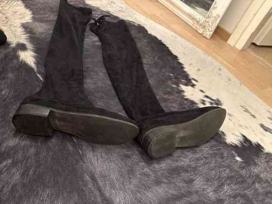 Mustat pitkät saappaat Kuopio