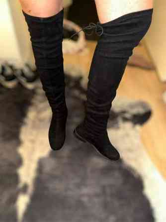 Mustat pitkät saappaat Kuopio