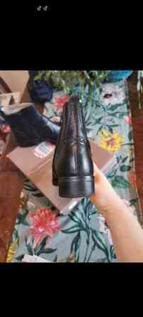 Tamariksen mustat saappaat Vantaa