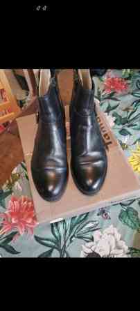 Tamariksen mustat saappaat Vantaa