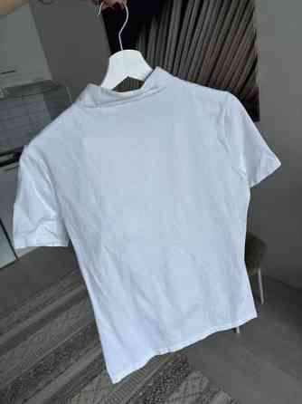 Kilpailuasu paita ja housut Helsinki