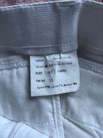 Kilpailuasu paita ja housut Helsinki