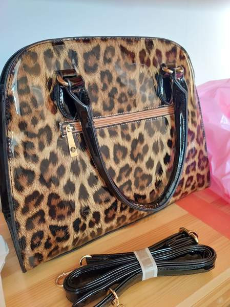 Upea leopardi - kuultolaukku. Uusi Helsinki - valokuva 3