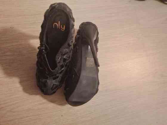 Myydään täysin uudet korkokengät Оулу