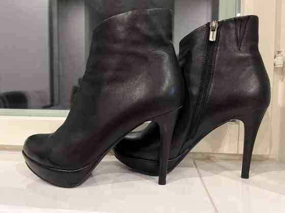 Mustat nilkkurit 38 Лахти