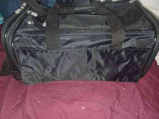 Kissan/koiran perässä vedettävä tai kannettava kuljetuslaukku Lohja