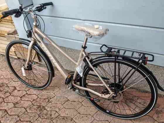 Myydään uusi naisten pyörä 28" TUNTURI HYBRID TX500 K.SEHIR 480H 18-V Jämsä