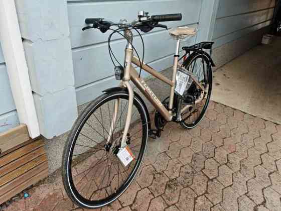 Myydään uusi naisten pyörä 28" TUNTURI HYBRID TX500 K.SEHIR 480H 18-V Jämsä