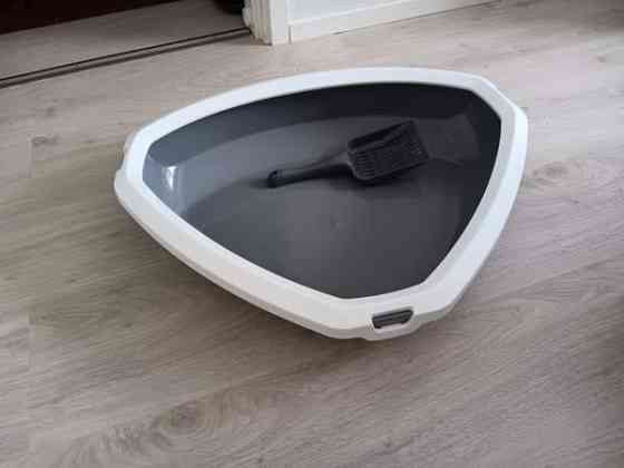 Kulmahiekkalaatikko ja lapio Savitaipale