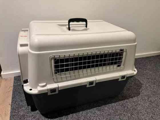 Käyttämätön Koiran kovamuovinen lentokuljetushäkki. Helsinki