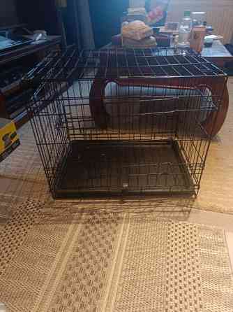 Kevytrakenteinen eläinhäkki esim koiralle ja pehmuste (61cmx43cmx51cm) Espoo