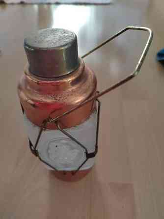 Lyhdyn mallinen soittorasia ja piilopullo Mynämäki