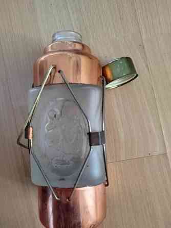 Lyhdyn mallinen soittorasia ja piilopullo Mynämäki