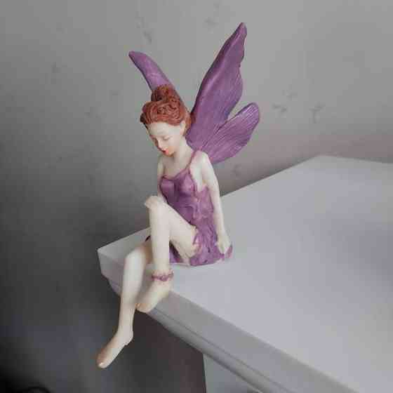 Kaunis istuva keiju Raisio