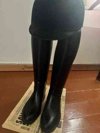 Ratsastussaapaat ja ratsastuskypärä Tuusniemi