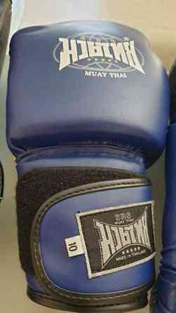 Käyttämättömät thai nyrkkeilyhanskat 10, säärisuojat s, pistarit Raasepori