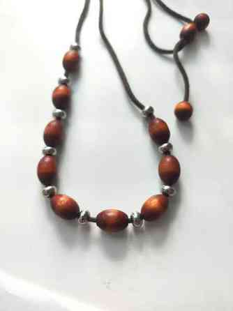 Puinen kaulakoru Нурмиярви