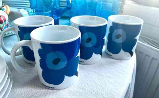 Marimekon kupit ja lautaset Jaervenpaeae