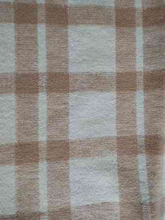 Kaksi vaaleaa puuvillahuopaa Helsinki