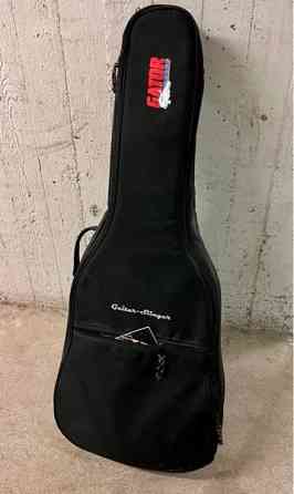 Akustinen kitara kantopussilla Jyvaeskylae