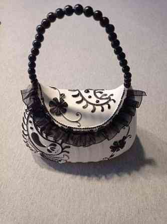 Käsilaukku säästölipas Мянтсяля