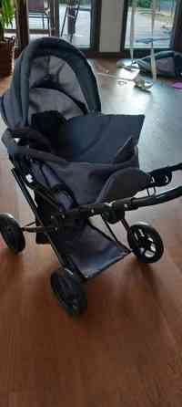 Harmaat nukenvaunut kantokassilla Lohja