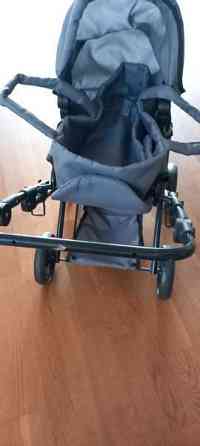 Harmaat nukenvaunut kantokassilla Lohja