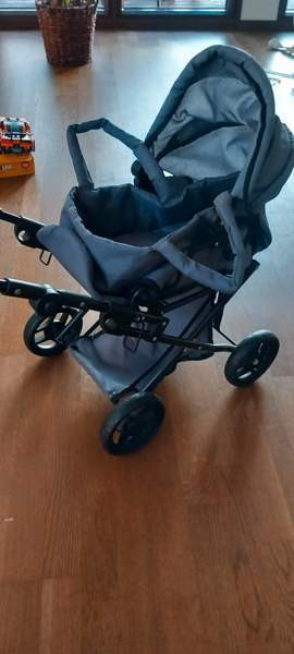 Harmaat nukenvaunut kantokassilla Lohja - valokuva 1