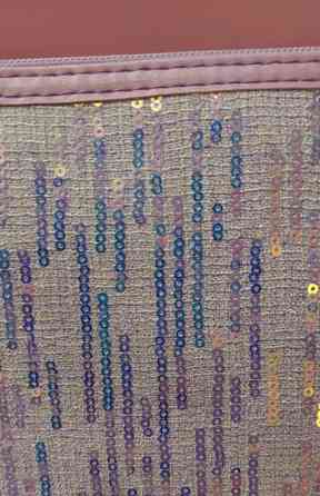 Paljetein koristeltu liila meikkilaukku Vantaa