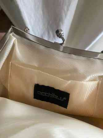 Occhiblu käsilaukku Haemeenlinna