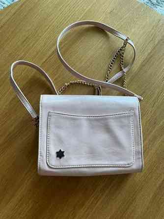 Klingin roosa laukku Турку